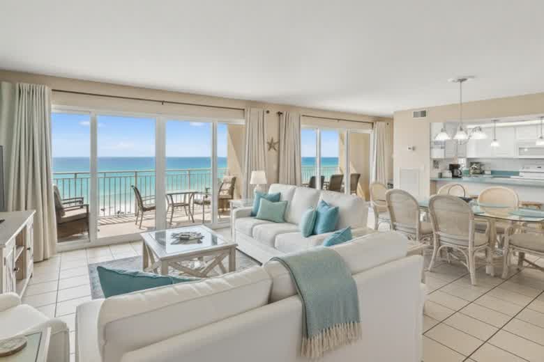 Bright vacation rental living room with a view of the Gulf in Panama City Beach